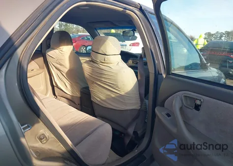 1999 Toyota Camry Le z USA, uszkodzony, nr VIN 4T1BG28K9XU593698